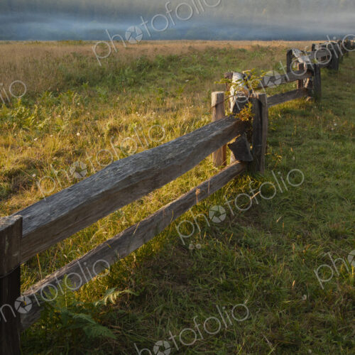 Wooden fence in rural landscape