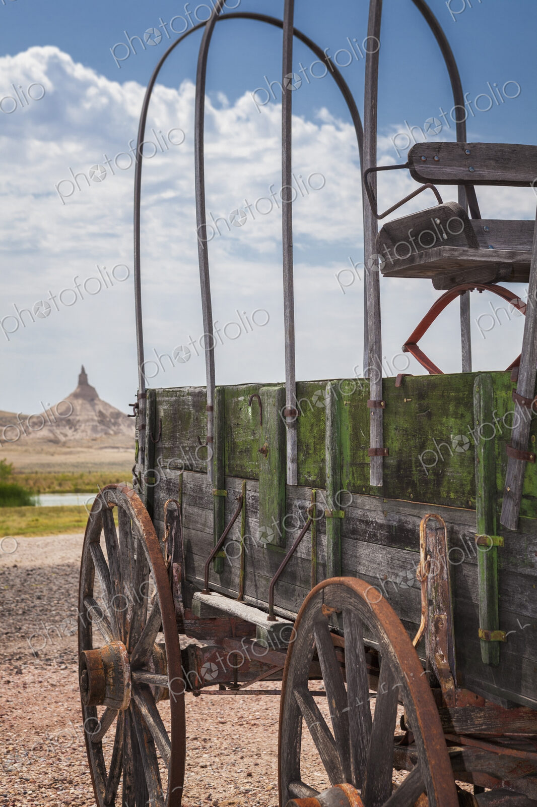 Wooden wagon and Chimney Rock, Nebraska, United States