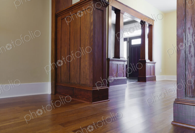 Woodwork and hardwood floor in empty house