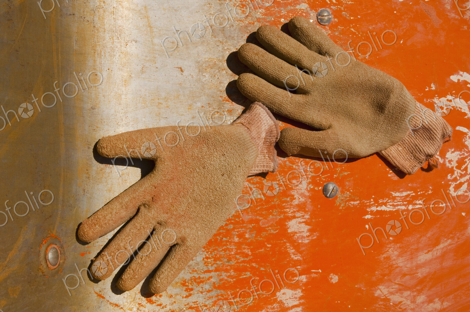Work Gloves on Metal Surface
