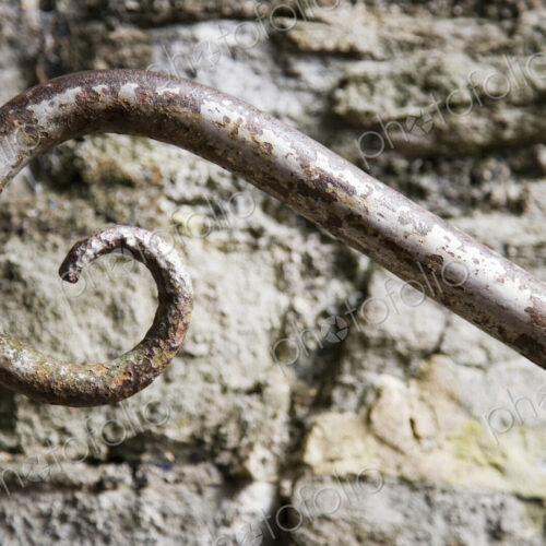 Wrought Iron Spiral and Stone Wall Wrought Iron Spiral and Stone Wall