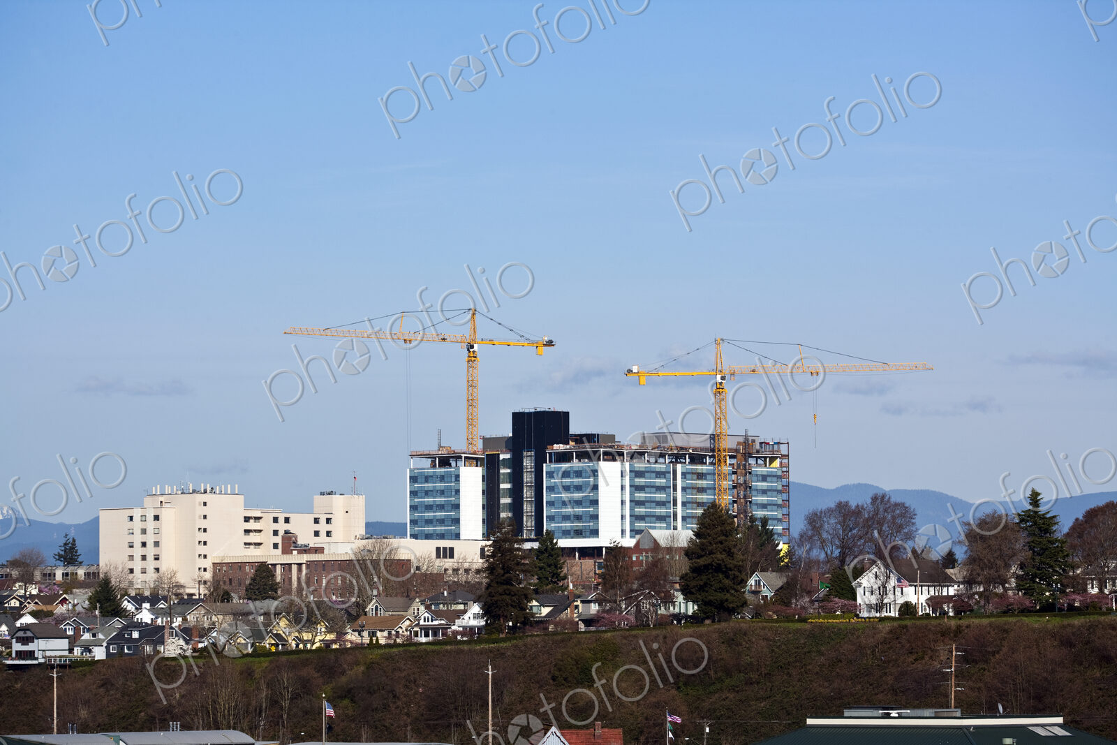 Yellow Tower Cranes at a Construction Site