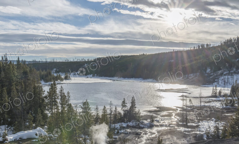 Yellowstone National Park, a view across the water at sunset.