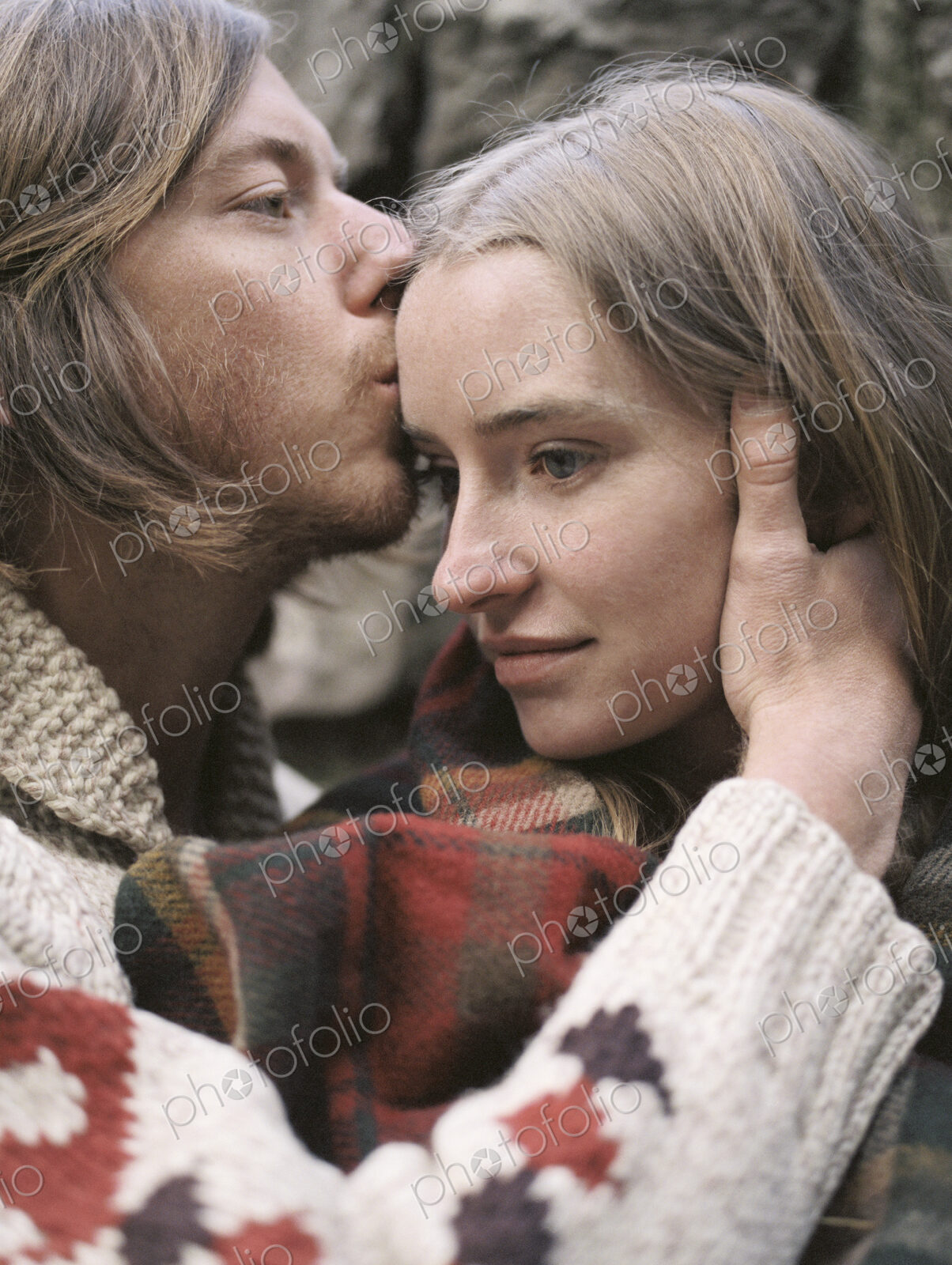 Young couple kissing.