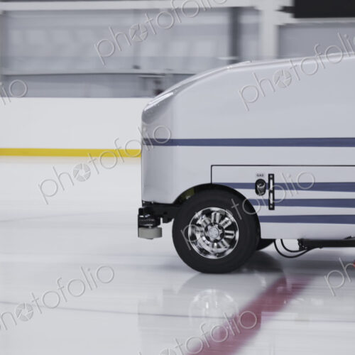 Zamboni ice resurfacing machinery, smoothing and repairing ice rink. Zamboni ice resurfacing machinery, smoothing and repairing ice rink.